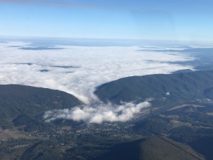 Low cloud layer flowing into a valley