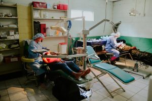 Dentist helping at the 2022 Medical Brigade